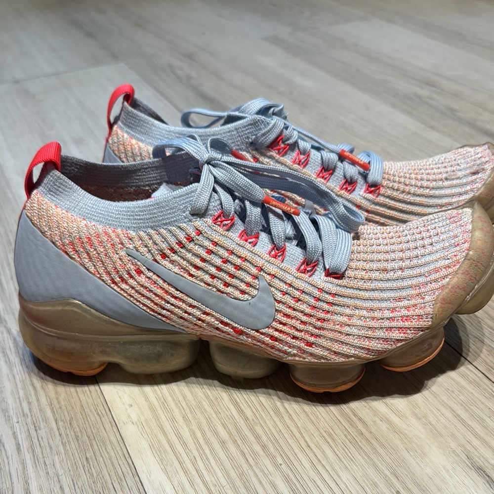 Nike Gray and Orange Athletic Shoes with Air Cushioning